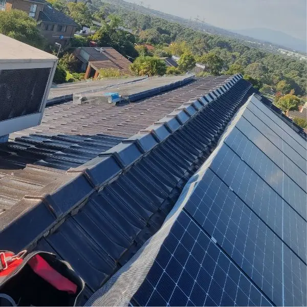 Ridge line repointed on a recoated tile roof — Roof Restoration Services Northern Suburbs Melbourne